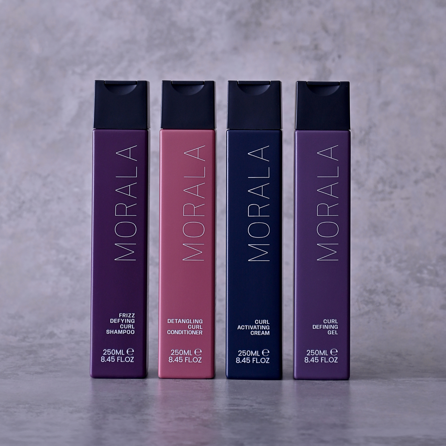 Style your curly hair using the full Morala Curl Restoration Bundle which includes the frizz defying shampoo, detangling curl conditioner, curl activating cream and curl defining gel.